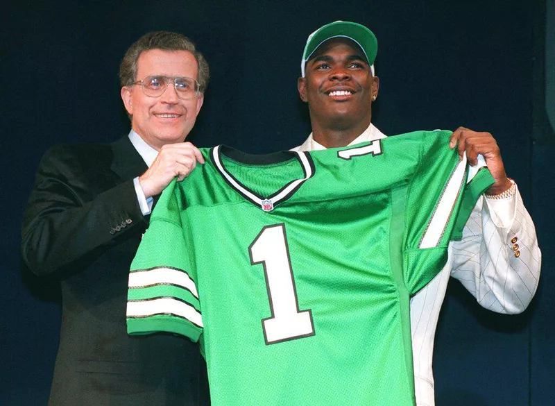 USC wide receiver Keyshawn Johnson and NFL commissioner Paul Tagliabue