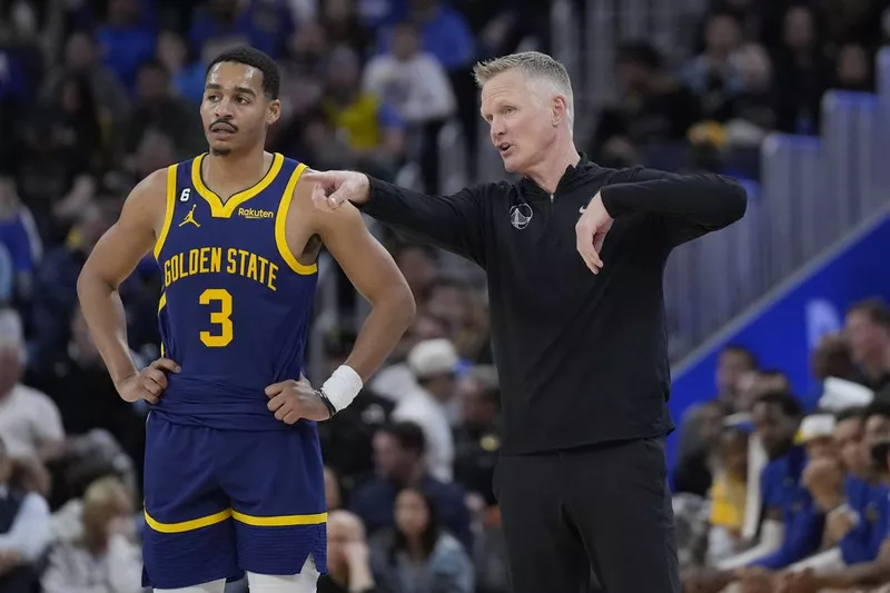Jordan Poole and Steve Kerr