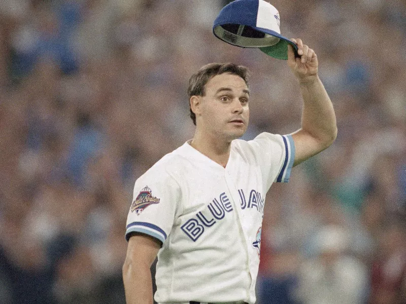 Toronto Blue Jays pitcher Jimmy Key doffs his cap
